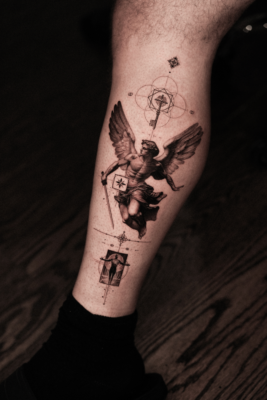 Migo — religious tattoo