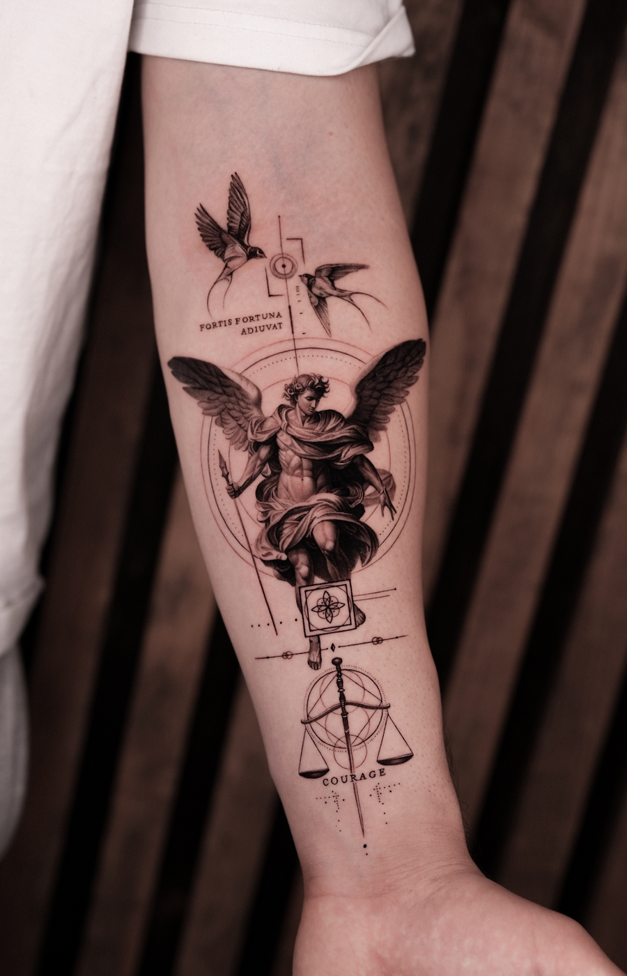 Migo — religious tattoo